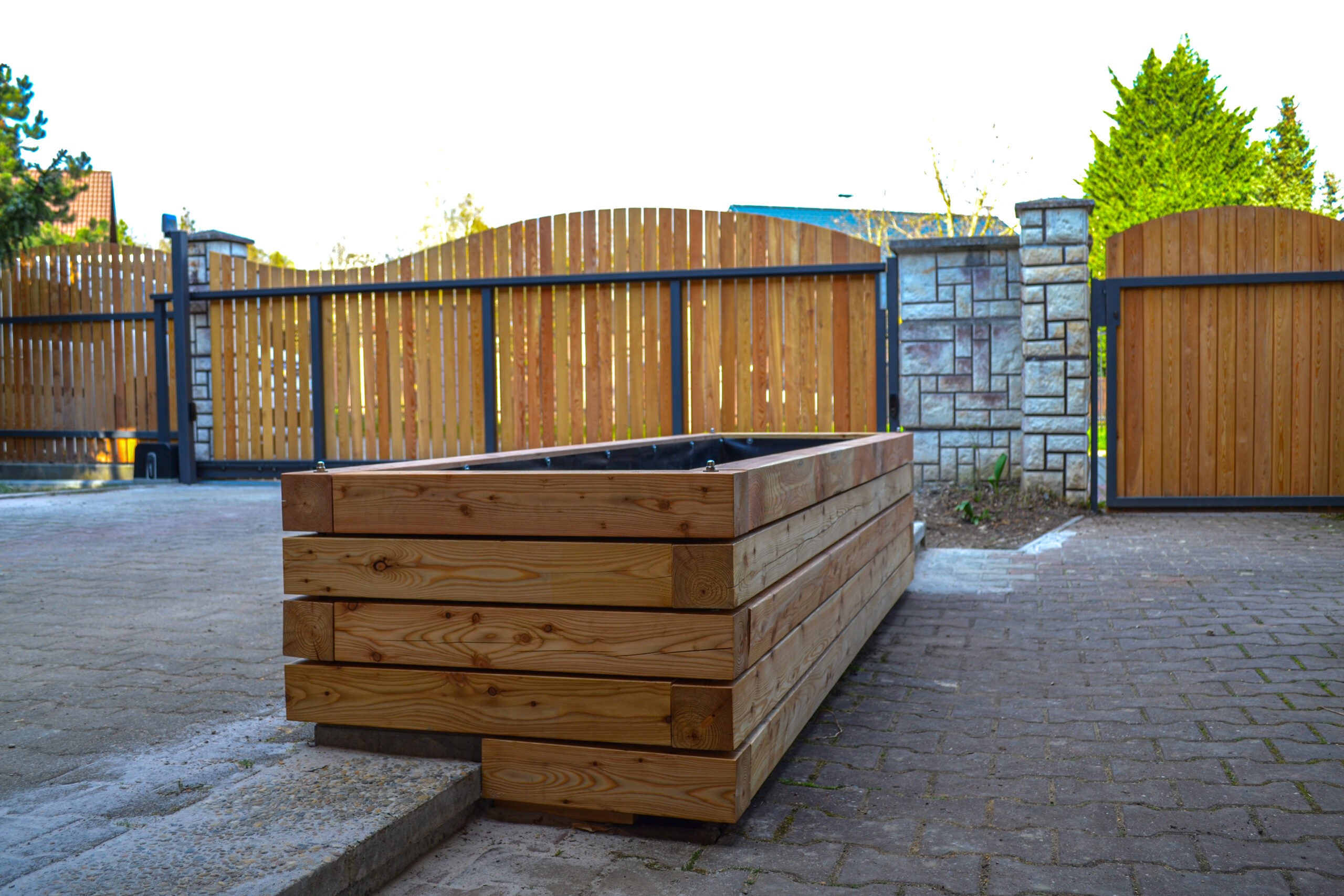 Fotografie plotu a květináče 2